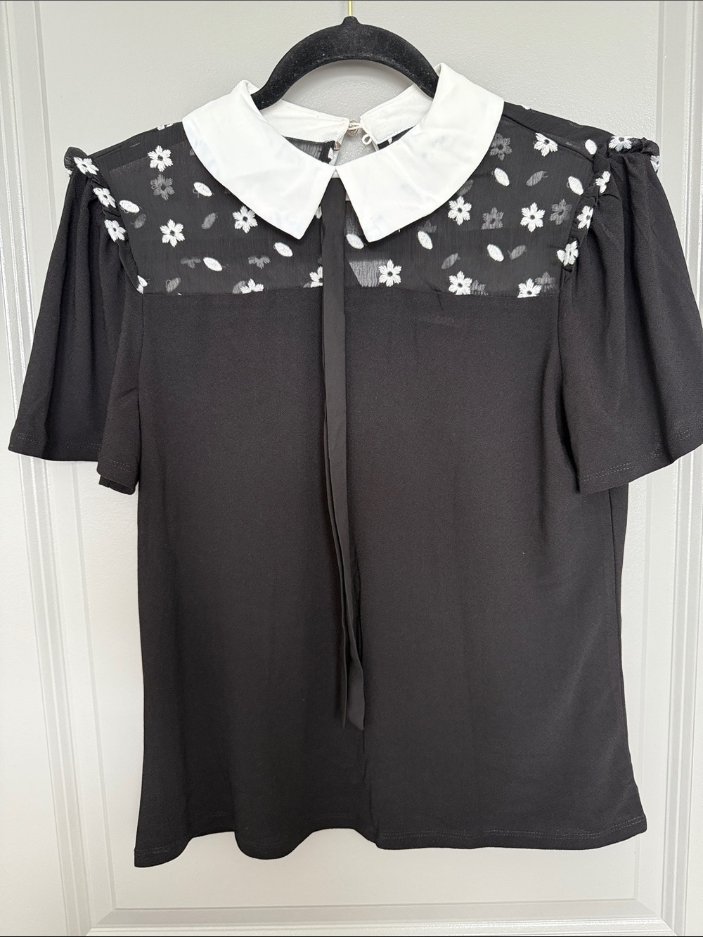 CeCe Black Top with White Peter Pan Collar and Floral Yoke